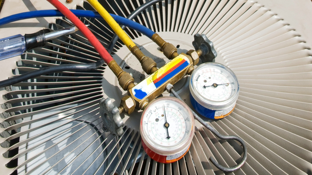 What is freon and how does it work? Learn how this gas, depicted with gauges and red, yellow, and blue tubes, works in your home air conditioner.