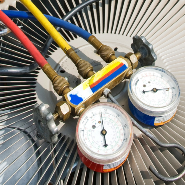 What is freon and how does it work? Learn how this gas, depicted with gauges and red, yellow, and blue tubes, works in your home air conditioner.
